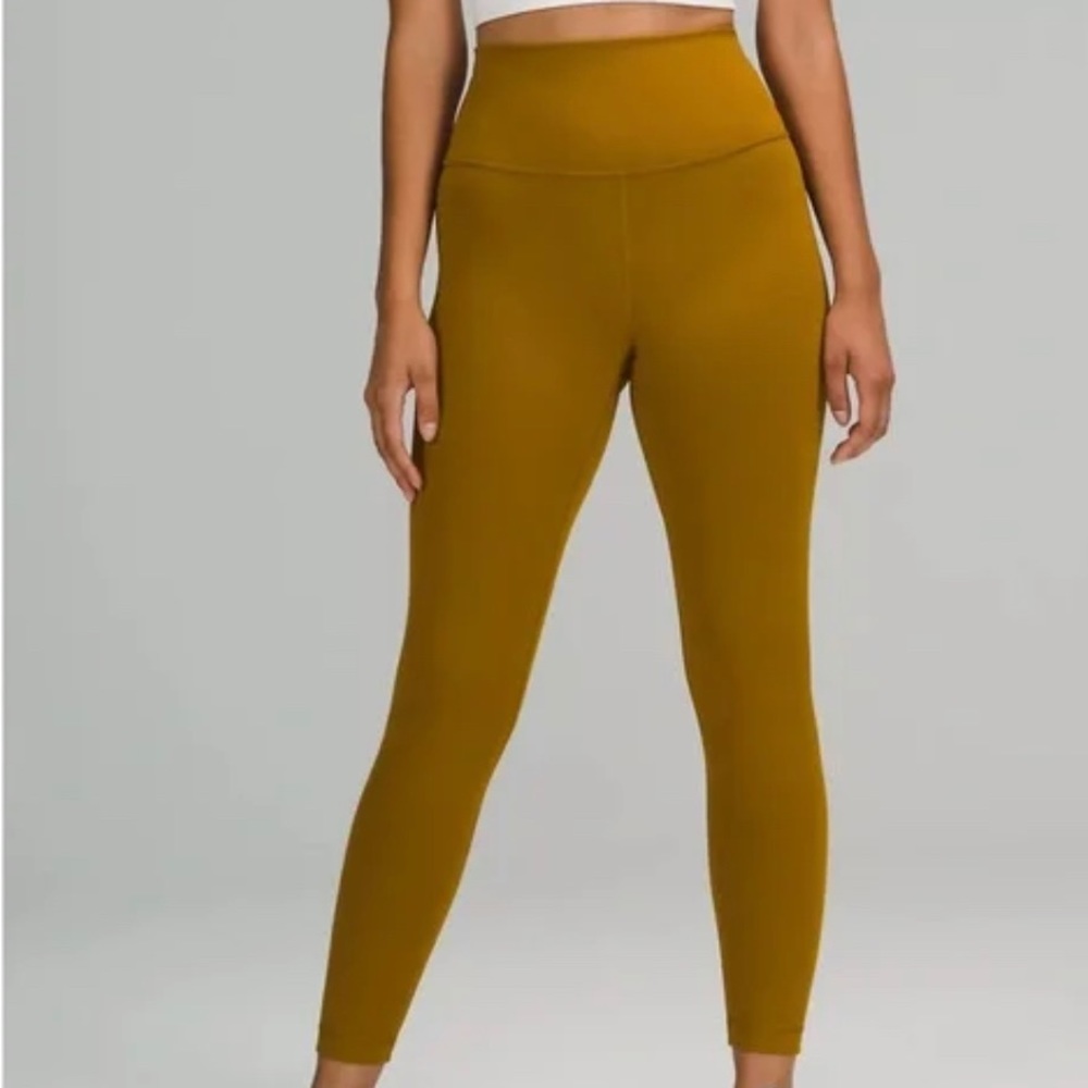 Wunder train high rise tight size 0 in gold spice